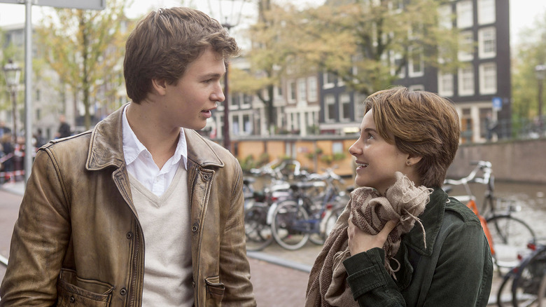 Gus and Hazel walking along a canal in Amsterdam in The Fault in Our Stars