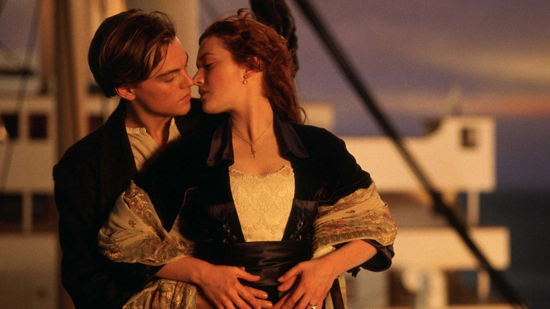 Jack about to kiss Rose on the bow of the ship in Titanic