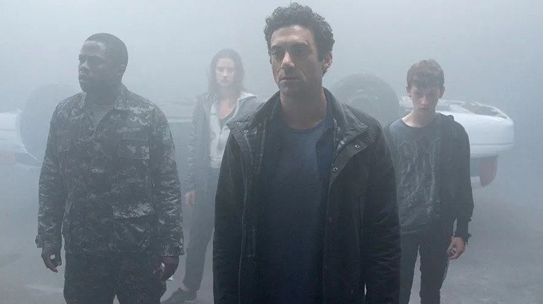 Kevin leads the townspeople through the mist in The Mist