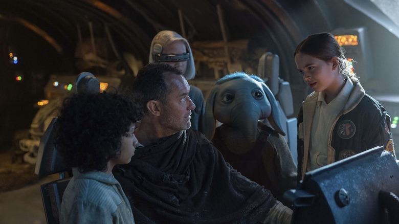 The kids stand around Jod in the pilot's seat in Skeleton Crew.