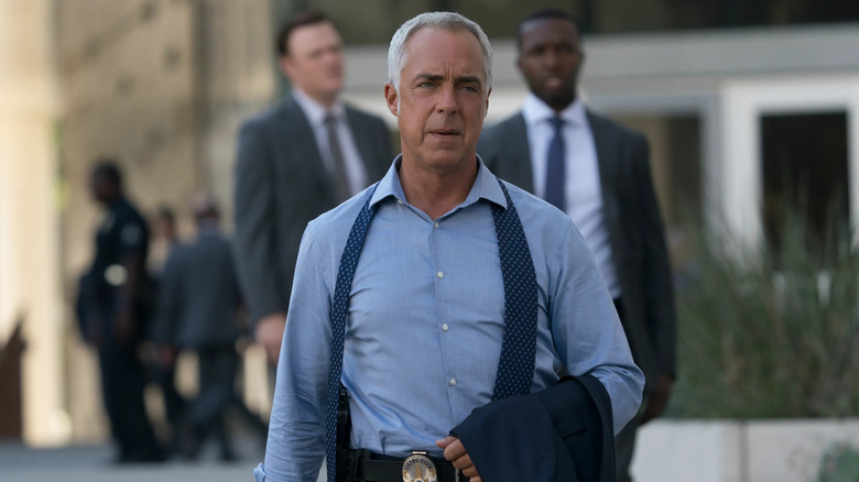 Bosch walks towards a crime scene in "Bosch" (2014-2021)
