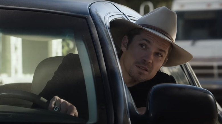 Raylan leans out the window of his car in "Justified" (2010-2015)