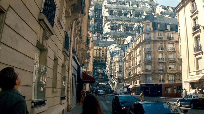 Dom Cobb and Ariadne looking a city folding over in "Inception"