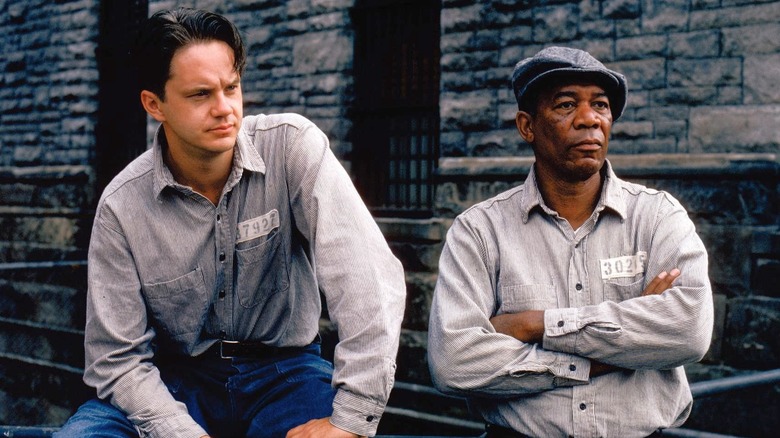 Andy Dufresne sitting with Red in "The Shawshank Redemption" (1994)