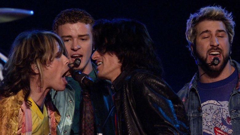 Aerosmith and NSYNC performing on stage during the 2001 Super Bowl halftime show