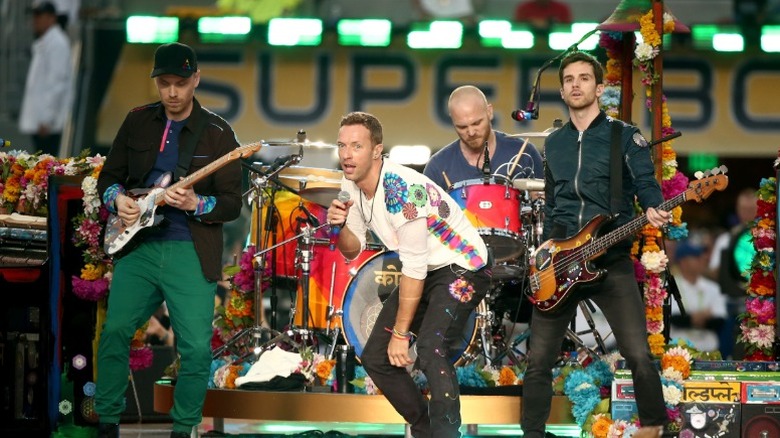 Coldplay performing on stage during the 2016 Super Bowl halftime show