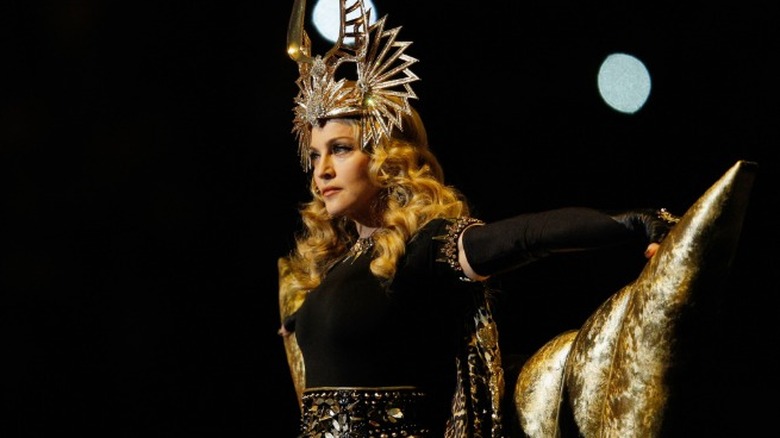 Madonna performing on stage at the 2012 Super Bowl halftime show