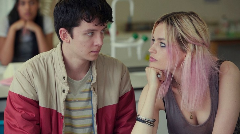 Otis and Maeve looking at each other in chemistry class on Sex Education