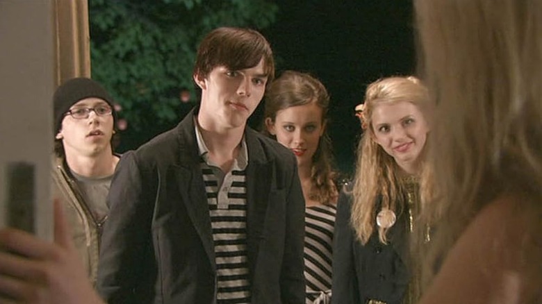 Sid Tony Michelle and Cassie in a doorway on Skins