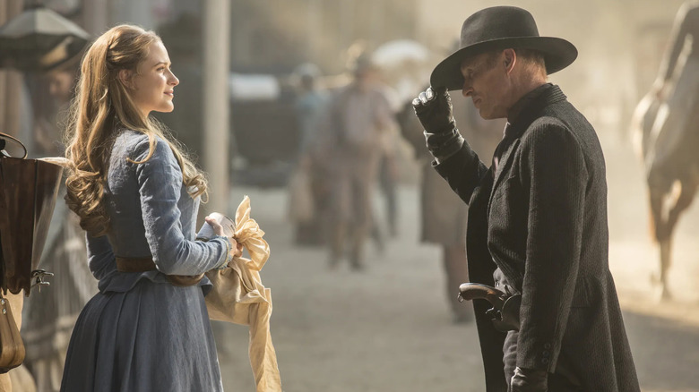 Dolores and The Man in Black meeting each other in Westworld's entry-point town for new guests