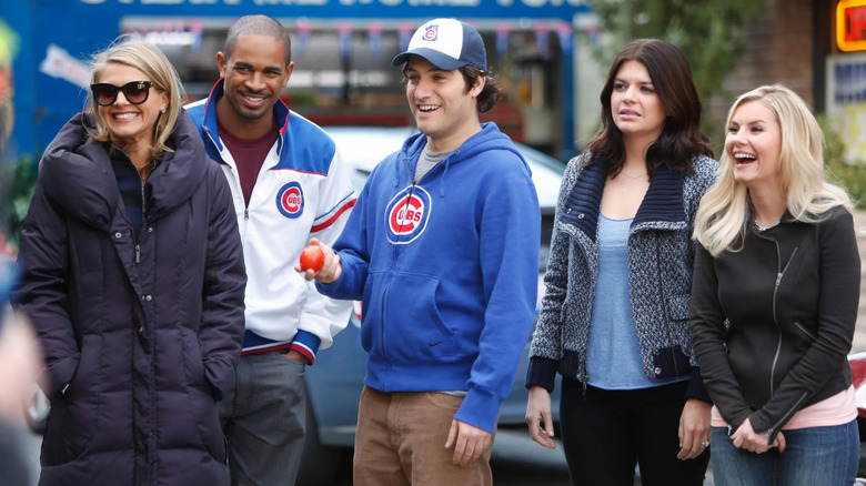 Jane Brad Max Penny and Alex outside talking to someone on Happy Endings