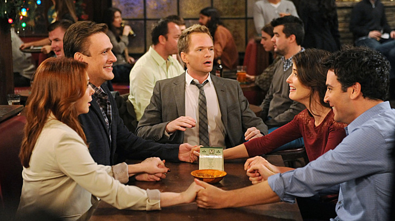 Lily Marshall Barney Robin and Ted at the bar on How I Met Your Mother