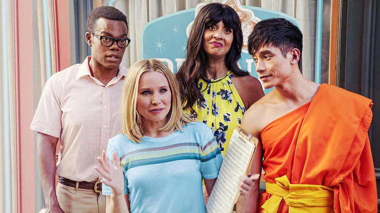 Chidi Eleanor Tahani and Jason looking incredulous on The Good Place