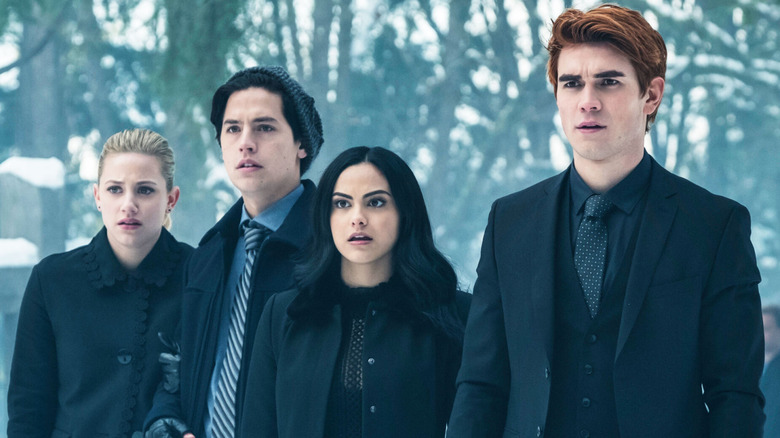 Archie, Betty, Veronica and Jughead are shocked at a winter funeral in "Riverdale"