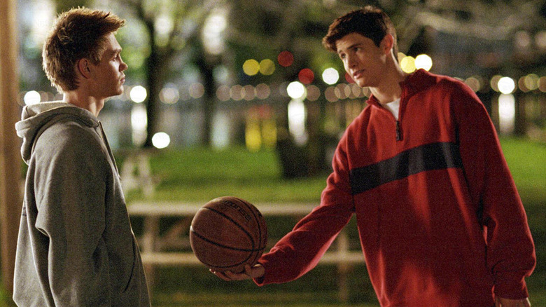 Nathan and Lucas with a basketball in "One Tree Hill"
