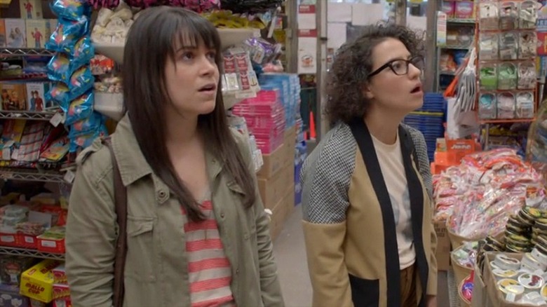 Abbi and Ilana go shopping in a bodega in Broad City.