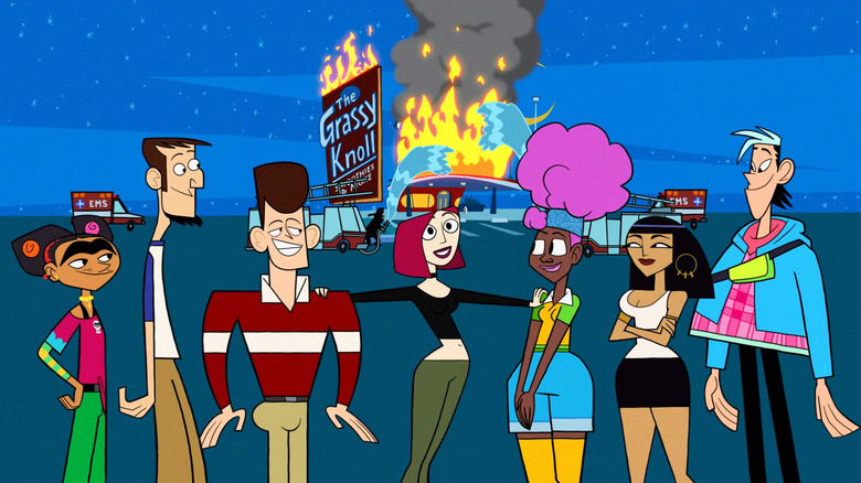 The clones pose in front of a burning Grassy Knoll in "Clone High"