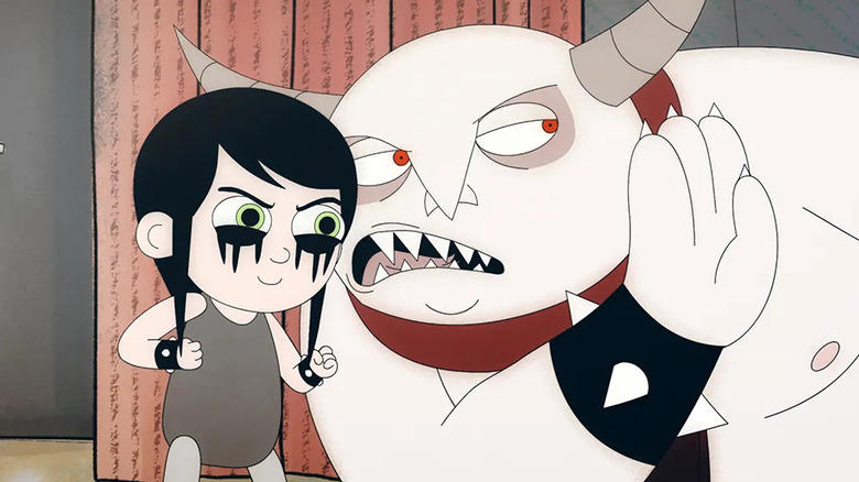 Golan whispers to Dylan in "Golan the Insatiable"