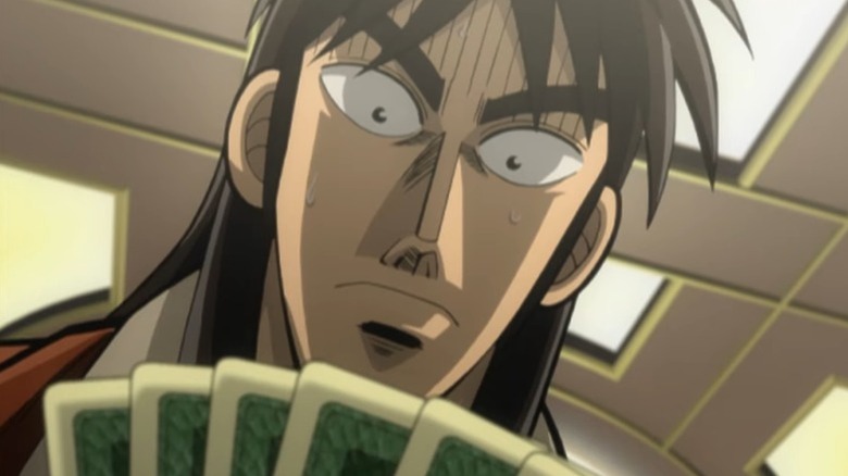 Kaiji examines a deck of cards on "Kaiji" (2007-2011)