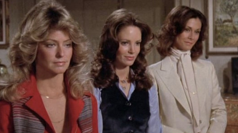 Jill, Kelly, and Sabrina talk to Charlie in Charlie's Angels