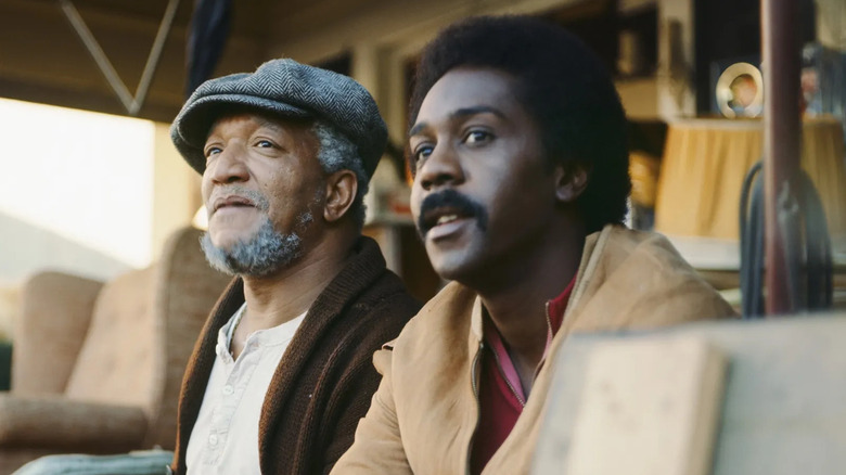 Fred and Lamont Sanford sit on the porch in Sanford and Son