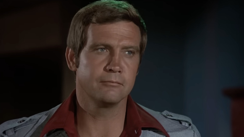 Steve Austin tilts his head in The Six Million Dollar Man