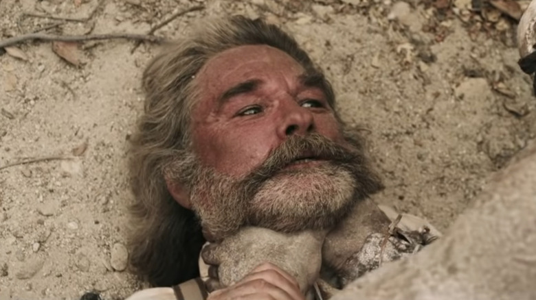 Kurt Russell being choked