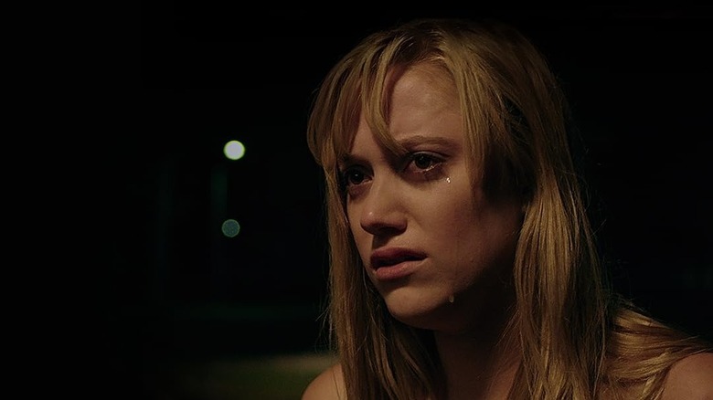 Jay looking upset and crying in It Follows