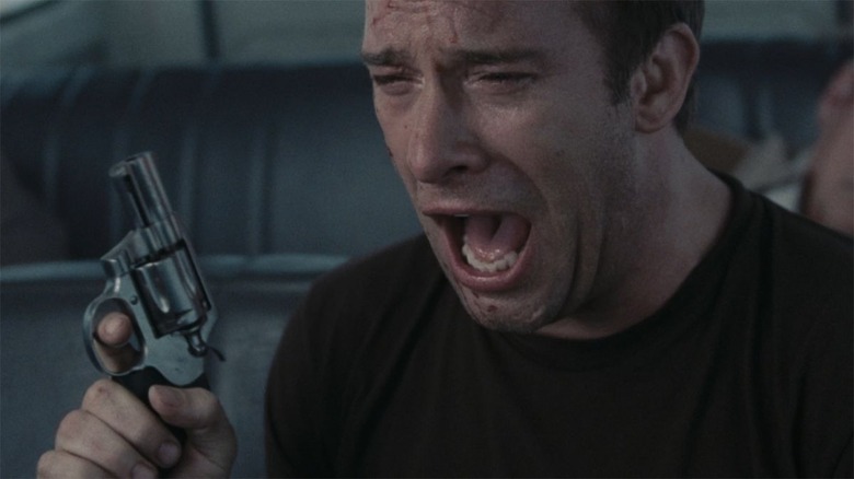 The Mist's David reacting in horror to what he's done