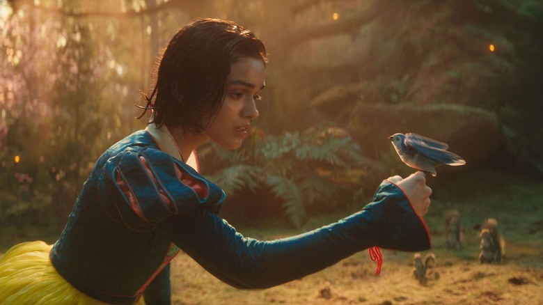 Snow White holding a bird in "Snow White"