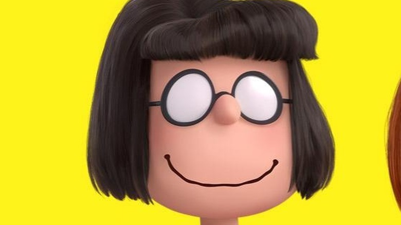Marcie smiles next to Peppermint Patty