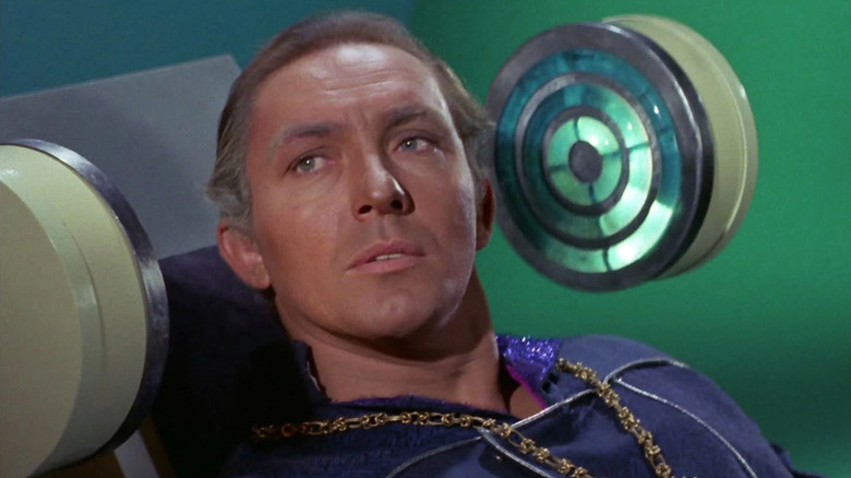 Garth sits on a biobed in Star Trek