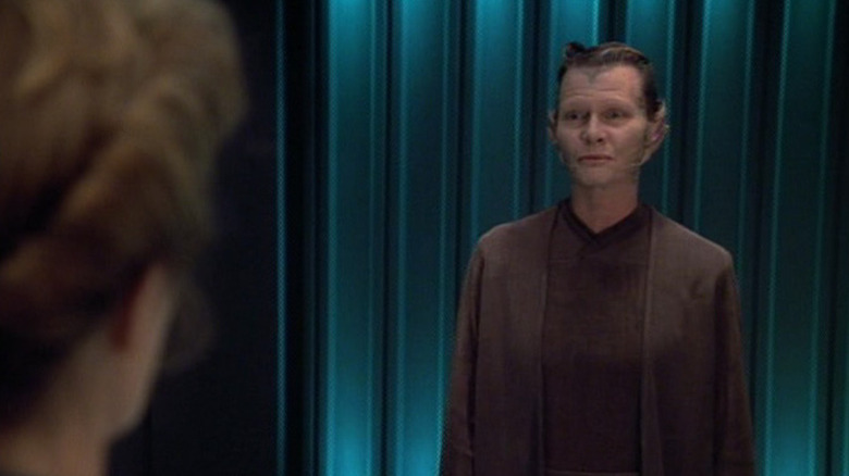 A Srivani scientist is confronted by Janeway in Star Trek: Voyager