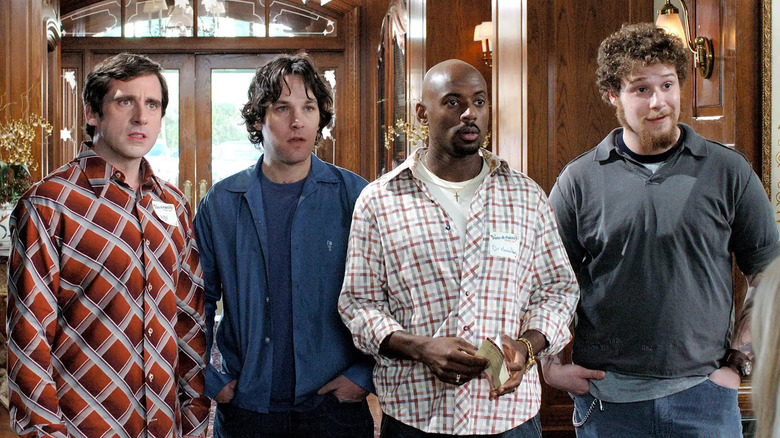 Andy David Jay and Cal looking at something in awe in The 40-Year-Old Virgin