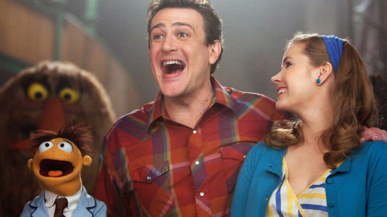 Walter Gary and Mary singing happily in The Muppet Movie