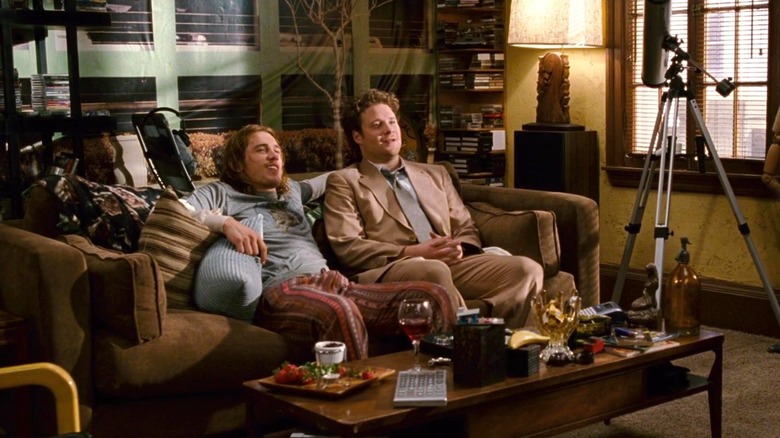 Saul Silver and Dale Denton sitting on a couch in Pineapple Express