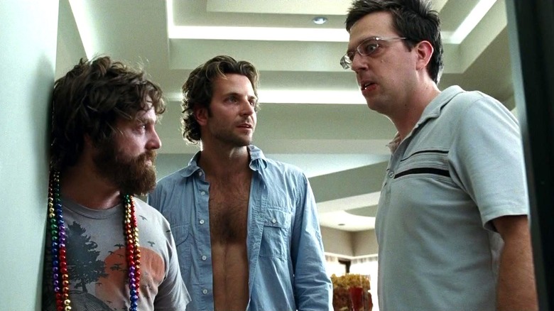 Alan Garner and Phil Wenneck looking at Stu Price in The Hangover
