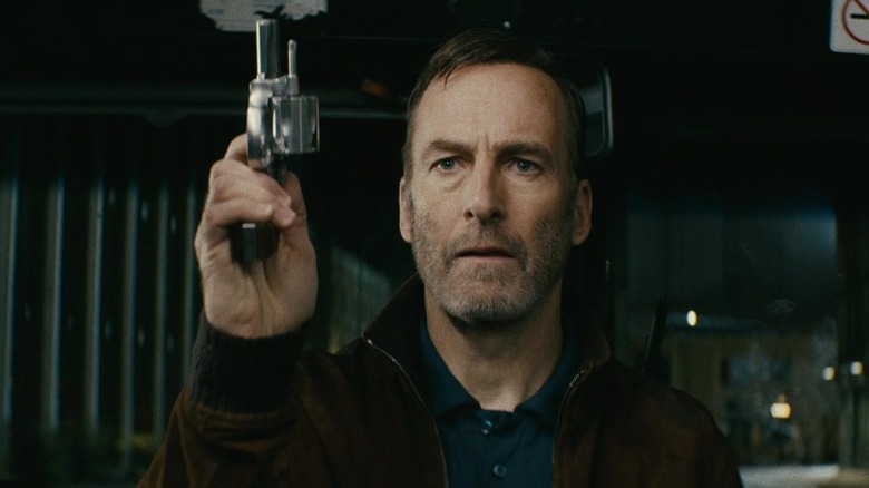 Bob Odenkirk holding gun