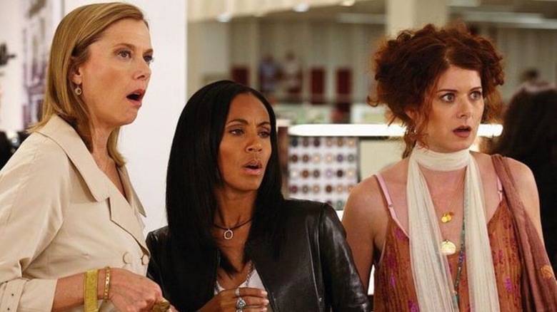 Sylvia, Alex, and Edie stand in shock in "The Women" (2008)