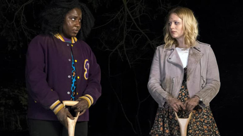 Raquel and Amy stare at each other