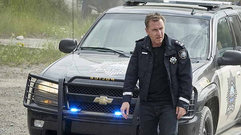 Jim Worth and police cruiser
