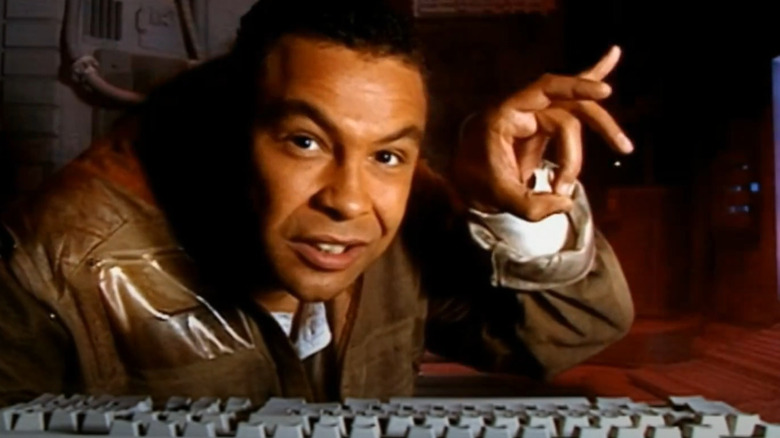 Dave Lister gesturing with hand