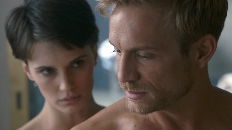 Chloe leans in behind Paul in "Double Lover" (2017)