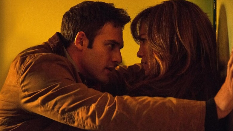 Noah pushes Claire up against a wall in "The Boy Next Door" (2015)