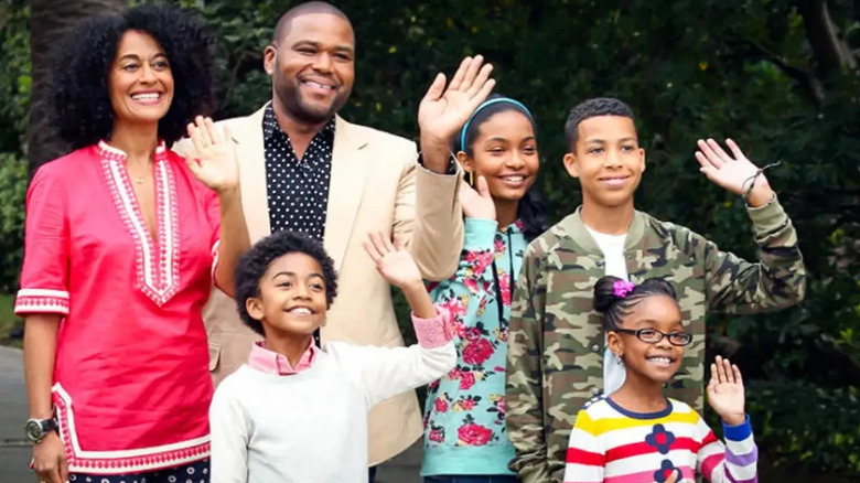 The Johnson family waving in "Black-ish."
