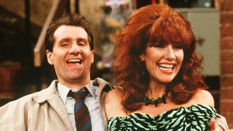 Al and Peggy smiling in "Married... with Children."