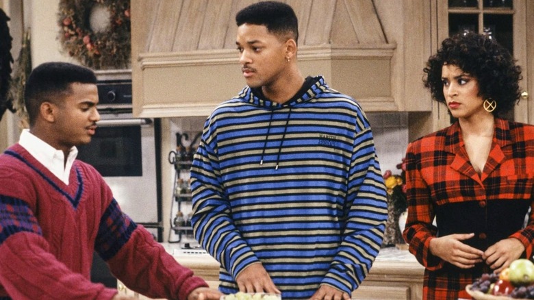 Carlton, Will, and Hilary standing in a kitchen in "The Fresh Prince of Bel-Air."