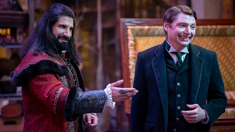 Nandor and Jerry smiling in "What We Do in the Shadows."