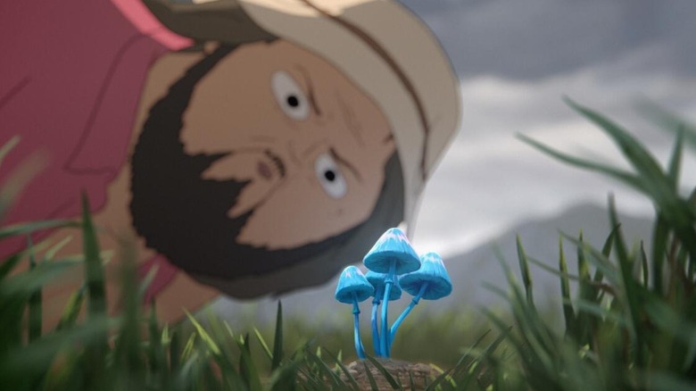 Marshall Cuso looking at a blue mushroom in Common Side Effects