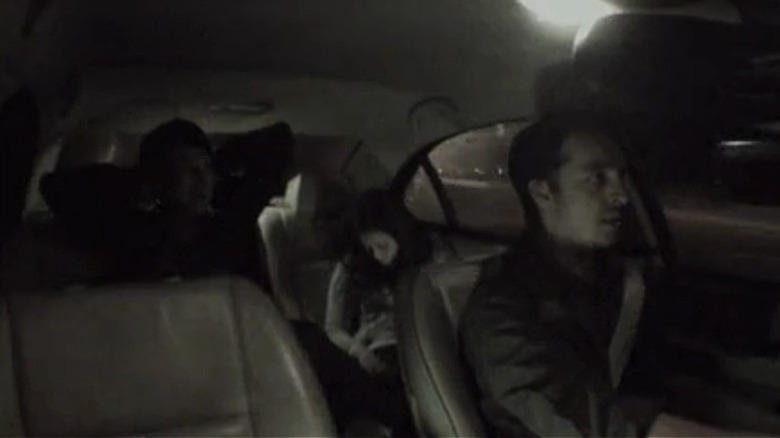 Ben, Michael, and Isabella riding in the car in "The Devil Inside"